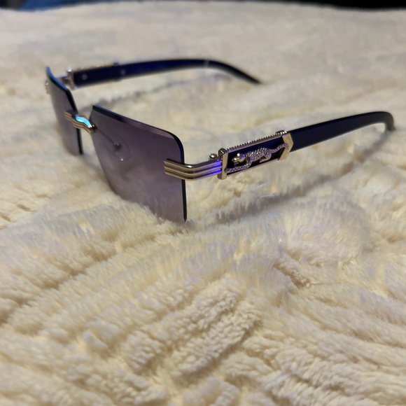Brand new Cartier sunglasses with cool purple tint